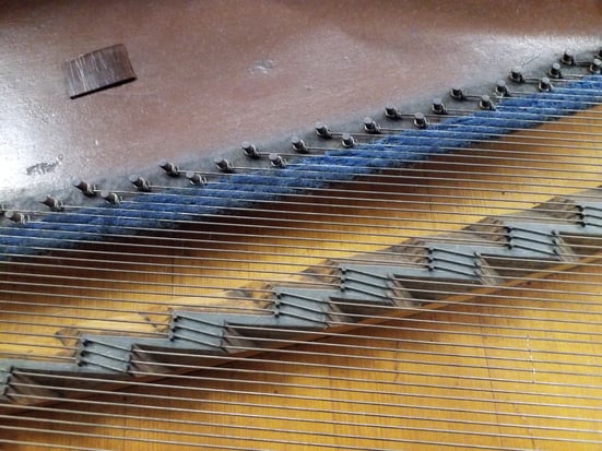 The interior of a Broadwood and Sons Grand piano
