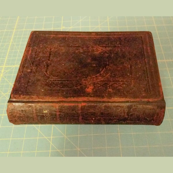 book repair restoration: leather bound bible after