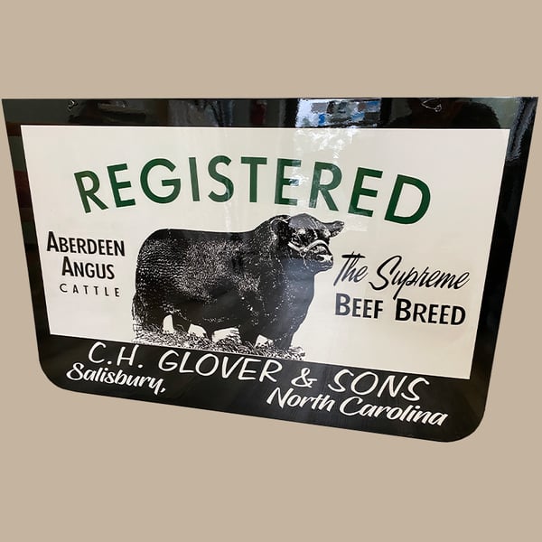 antique sign restoration: aberdeen angus metal sign after