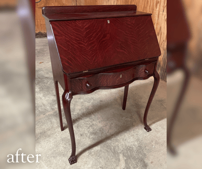 yellow painted secretary desk after paint was removed, now a deep wood tone